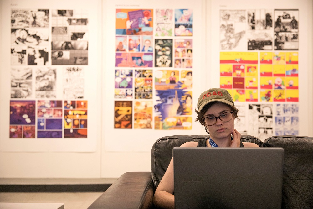 student sits on computer
