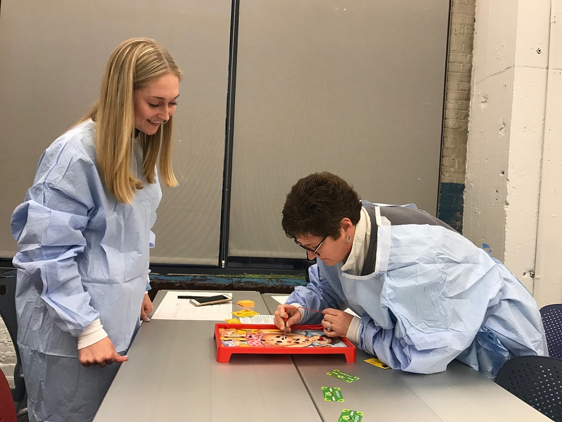 MDes students research better surgical gown design via the game Operation