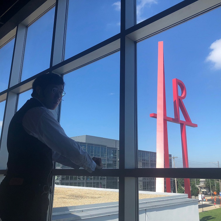 student and art sign in window