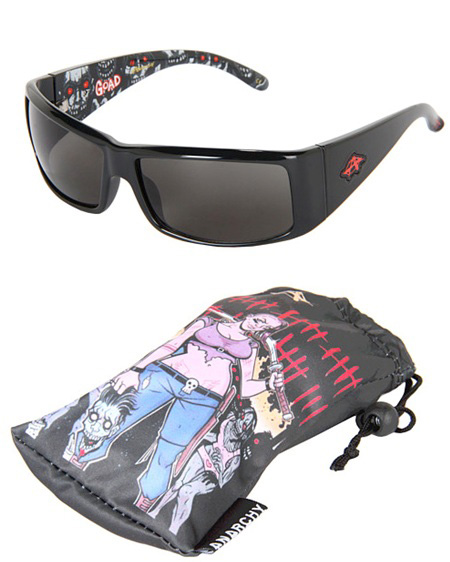 Illustration, Image of sunglasses with illustrations on interior of arms laying on a white background next to a leather pouch with an illustration of a women weilding a bat and holding a zombie head in one hand