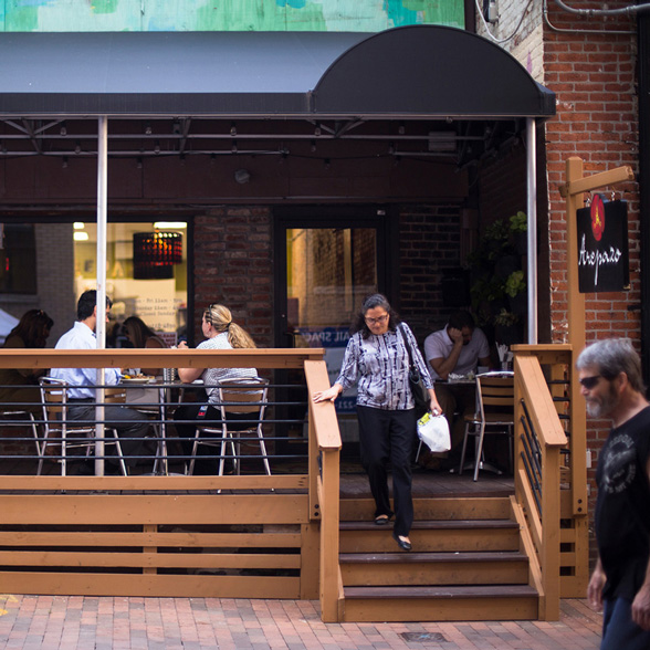 Life at CCAD, People eating at tables on outdoor deck at El Arepazo in downtown Columbus