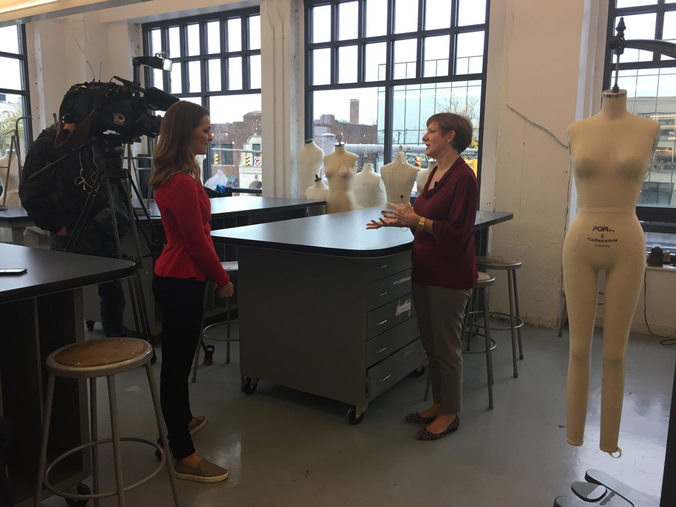 Fashion Design, CCAD Fashion Design Assistant Professor Rebecca Robinson talks about vanity sizing with reporter and camera in classroom