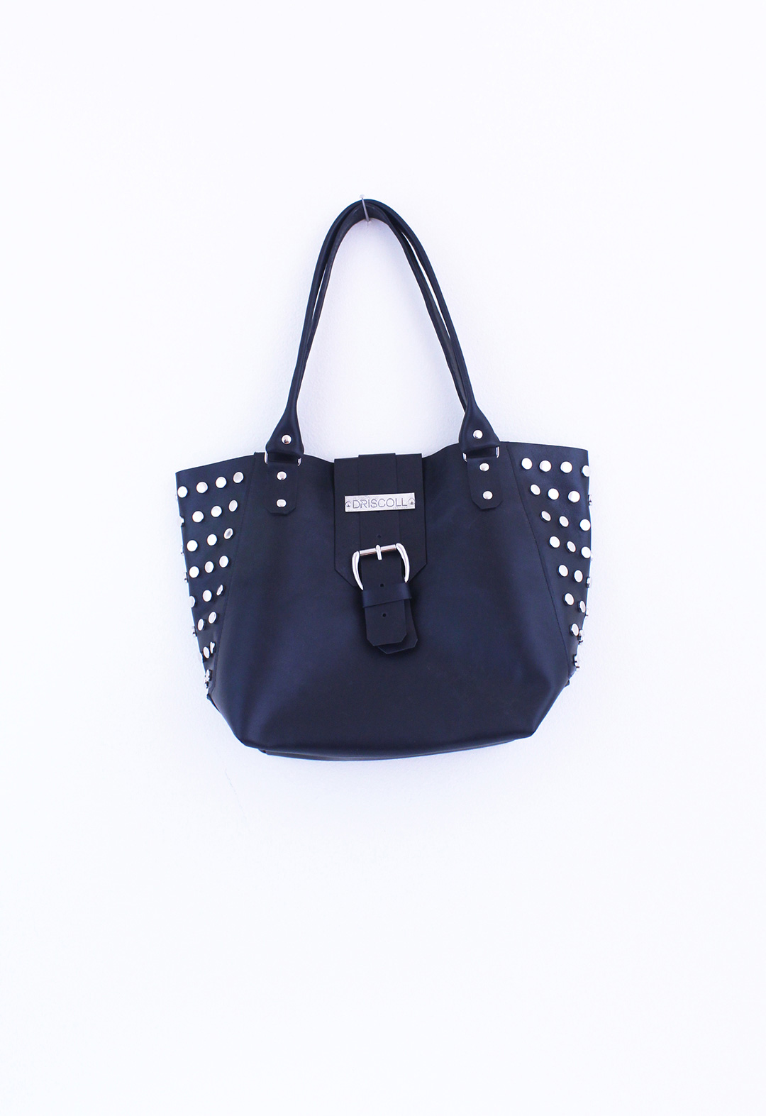 Fashion Design, Image of black handbag with silver hardware and studs on white background