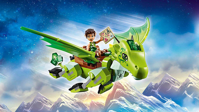 Illustration, Advertising & Graphic Design,  Image of Lego figure holding map riding green Lego dragon with blue starry sky and mountains in background