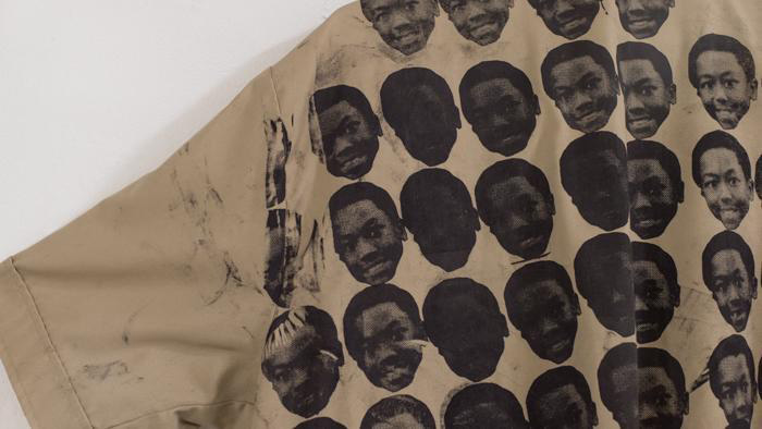 Fine Arts, up close detail of shirt with printed images of victims of police brutality