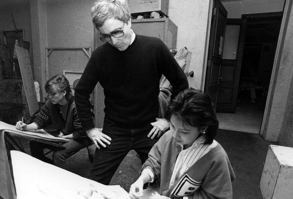 Fine Arts,Former Fine Arts Dean Lowell Tolstedt standing over student in classroom 