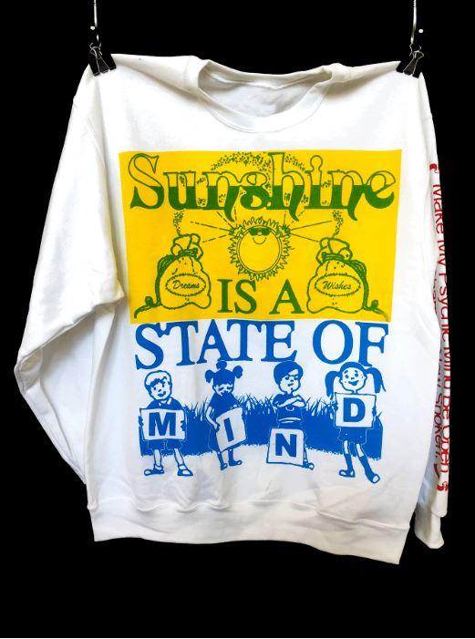 Fine Arts, Photo of white sweatshirt with yellow, green, and blue printed design