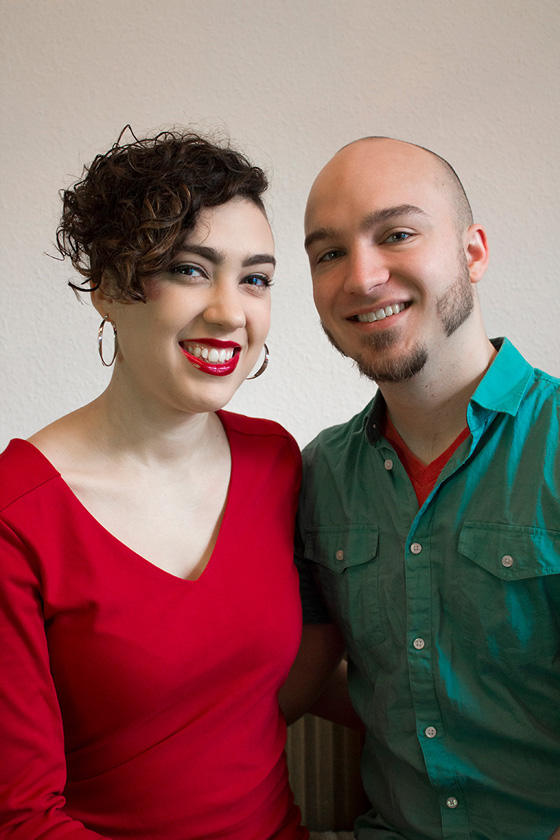 Illustration, Advertising & Graphic Design, Image of couple side by side, Lillie in red sweater, Wes in green button up layered over red shirt