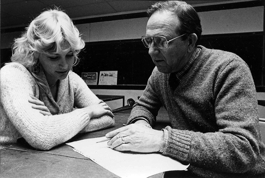 Former CCAD faculty member Ned Moore with a student.