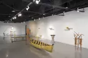 wood boat hanging from ceiling