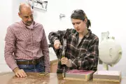 joel gundlach with student