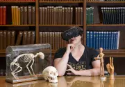 Director of Library Services Leslie Jankowski models unusual library items