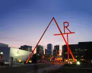 CCAD's iconic 100' tall ART sculpture backlit against the Columbus skyline