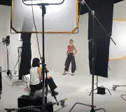 person getting photographed behind the scenes