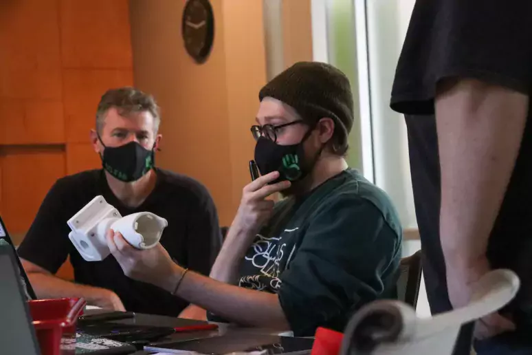 people working in masks
