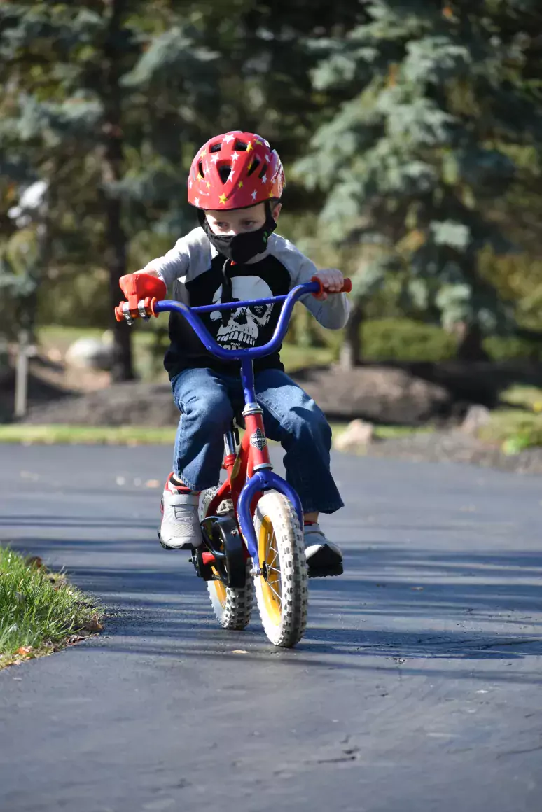 kid riding bike