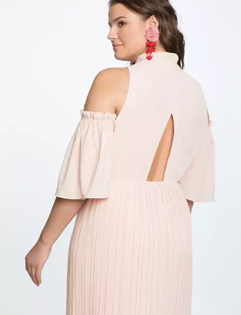 CCAD student pink dress ELOQUII looking over shoulder