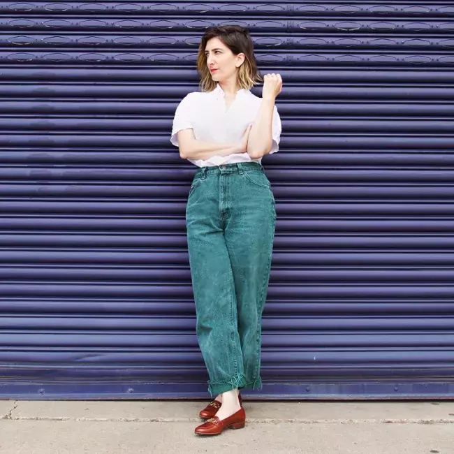michelle maguire in front of purple garage door