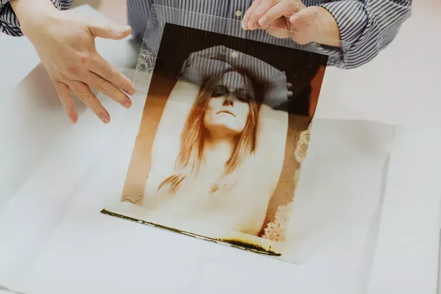 photo of woman developed on glass